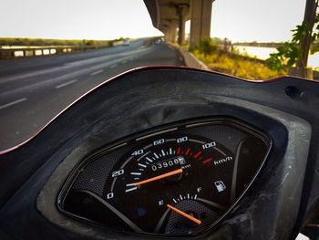 Close-up of vintage car on road