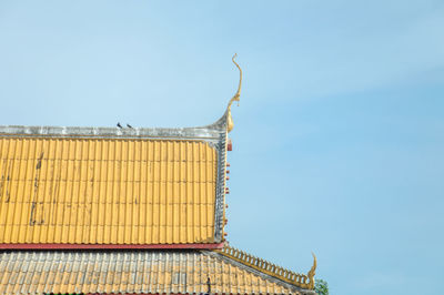 Low angle view of traditional building against clear sky