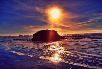 Scenic view of sea at sunset