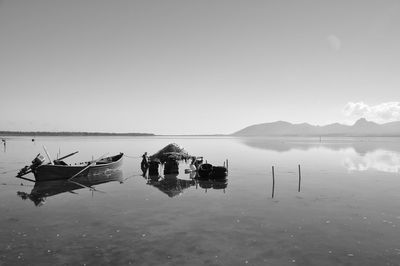 Scenic view of lake against clear sky