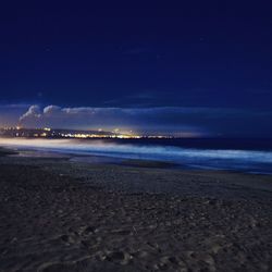 Scenic view of sea at night