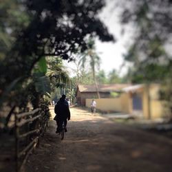 Full length of woman walking on road