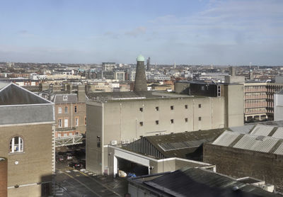 High angle view of buildings against sky in city