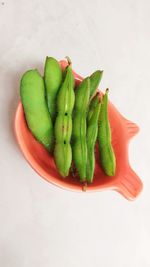 High angle view of green chili pepper on table