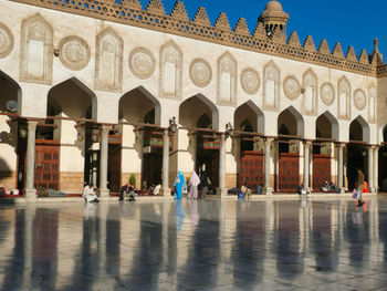 Group of people in front of building