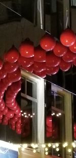 Close-up of red chili peppers at night