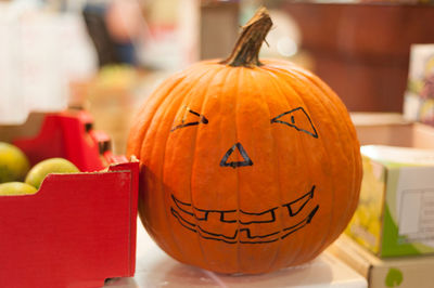 Close-up of jack o lantern on table at home