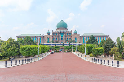 View of temple against cloudy sky