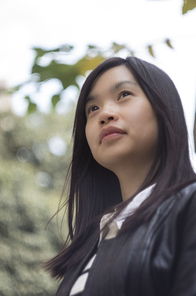 portrait, young adult, looking at camera, young women, person, headshot, long hair, front view, lifestyles, focus on foreground, head and shoulders, leisure activity, contemplation, close-up, smiling, serious