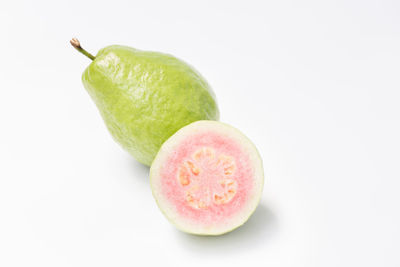 Close-up of fruits against white background