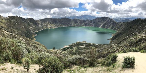 Panoramic view of lake and mountains against sky