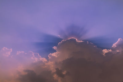 Low angle view of clouds in sky during sunset