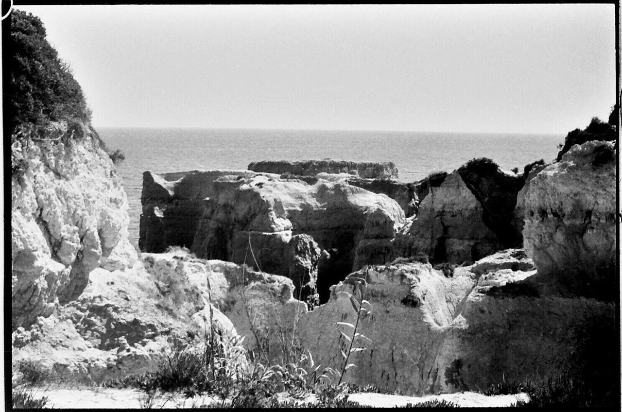 sea, nature, scenics, beauty in nature, water, rock - object, tranquility, day, tranquil scene, geology, horizon over water, beach, outdoors, no people, wave, sky