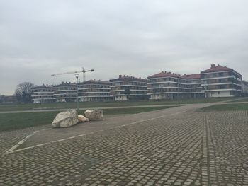 Built structure against cloudy sky