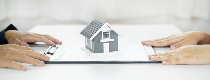 Midsection of businessman using laptop