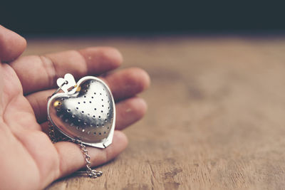 Close-up of person holding hands