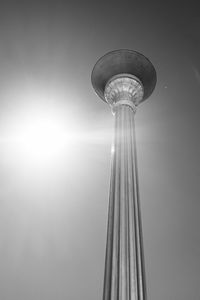 Low angle view of street light against sky