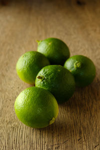 Close-up of green fruits on table