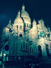 Cathedral against sky at night