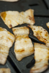 Close-up of meat on barbecue grill