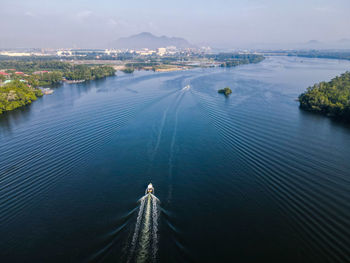 High angle view of river amidst city