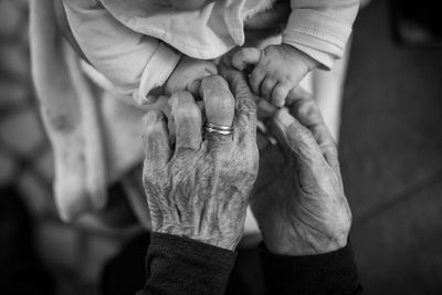 Close-up of woman holding hands