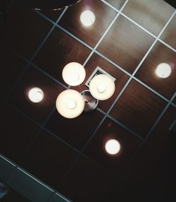 Low angle view of illuminated light bulb