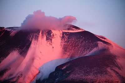 Panoramic view of volcanic landscape against sky during sunset