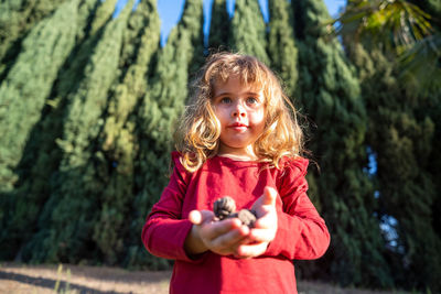 Portrait of young woman using mobile phone