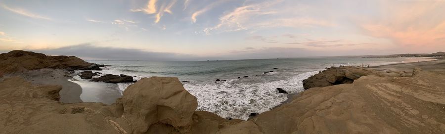 Panoramic view of sea against sky during sunset