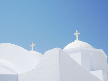 White greek church against clear sky