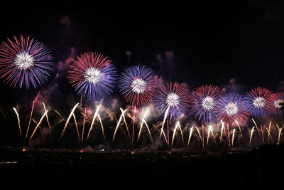 Firework display at night