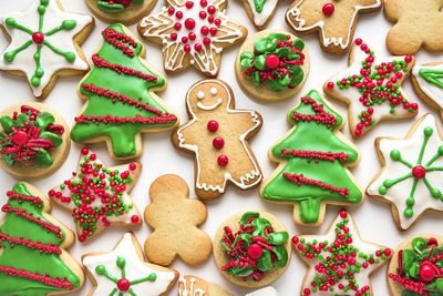 Directly above shot of christmas decorations on white background
