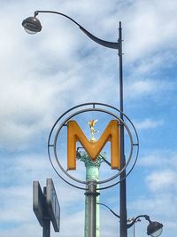 Low angle view of street light against sky