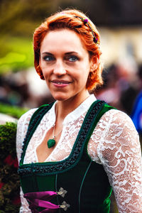Woman wearing dirndl looking away
