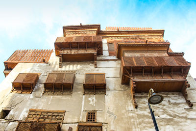Low angle view of old building against sky