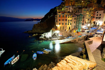 Panoramic view of sea and buildings against sky