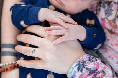 Midsection of woman with hands