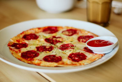 High angle view of pizza on table