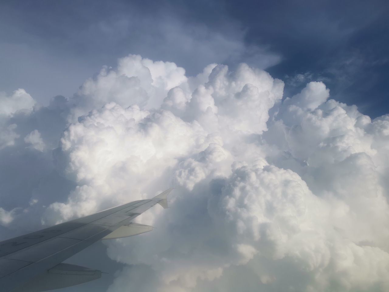 AERIAL VIEW OF CLOUDS OVER CLOUDSCAPE