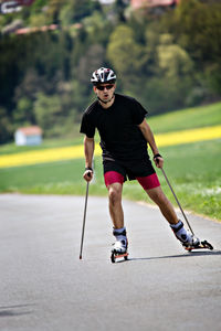 Full length of man inline skating in park