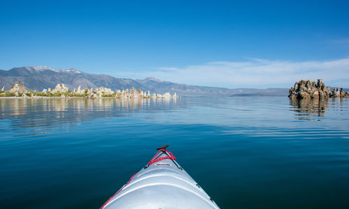 Scenic view of lake against blue sky