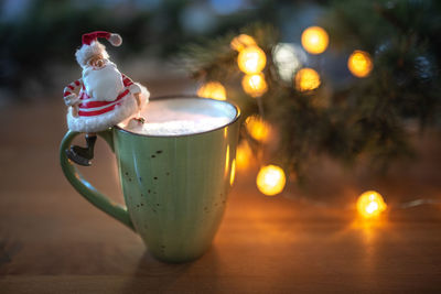 Merry christmas and new year greeting card, coffee time with cute santa claus
