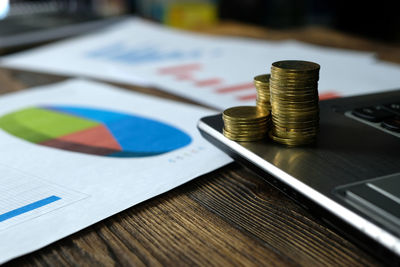 Close-up of coins on table