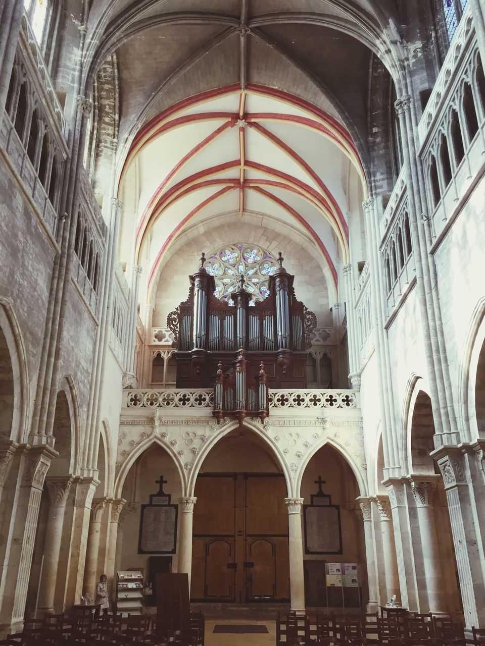 religion, place of worship, arch, architecture, spirituality, indoors, travel destinations, built structure, no people, day, rose window