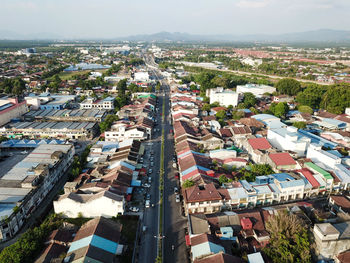 High angle view of street amidst buildings in city