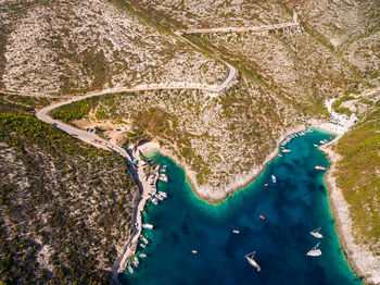 Aerial view of sea and landscape against sky