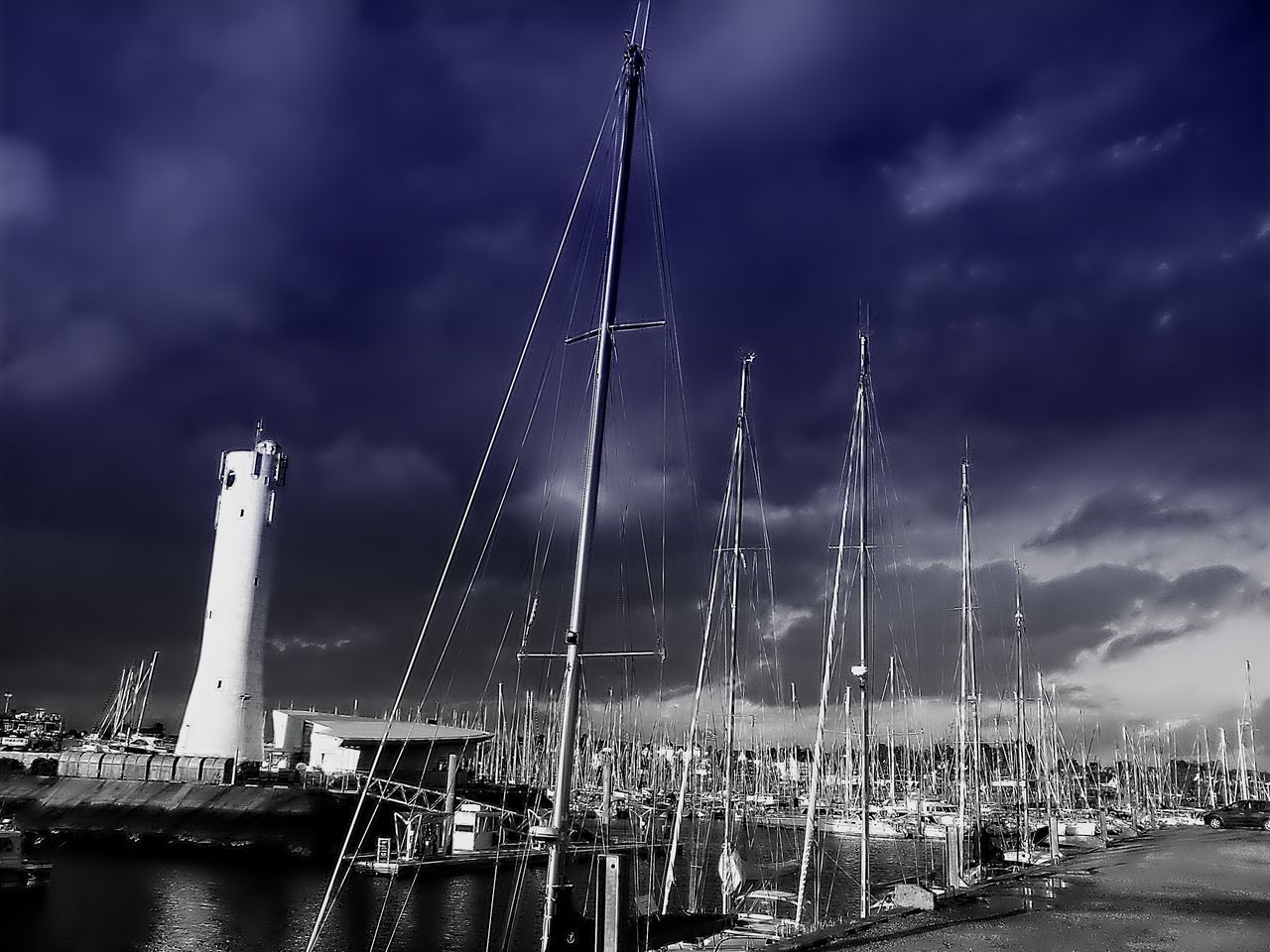 water, sky, cloud - sky, built structure, architecture, cloudy, river, city, sea, bridge - man made structure, building exterior, dusk, illuminated, weather, cloud, transportation, connection, travel destinations, night, engineering