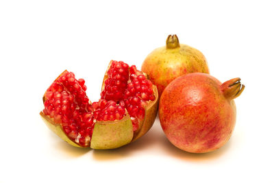 Close-up of fresh fruits against white background