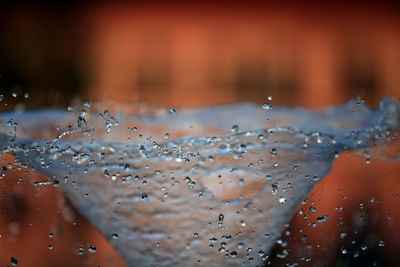 Close-up of raindrops on glass window